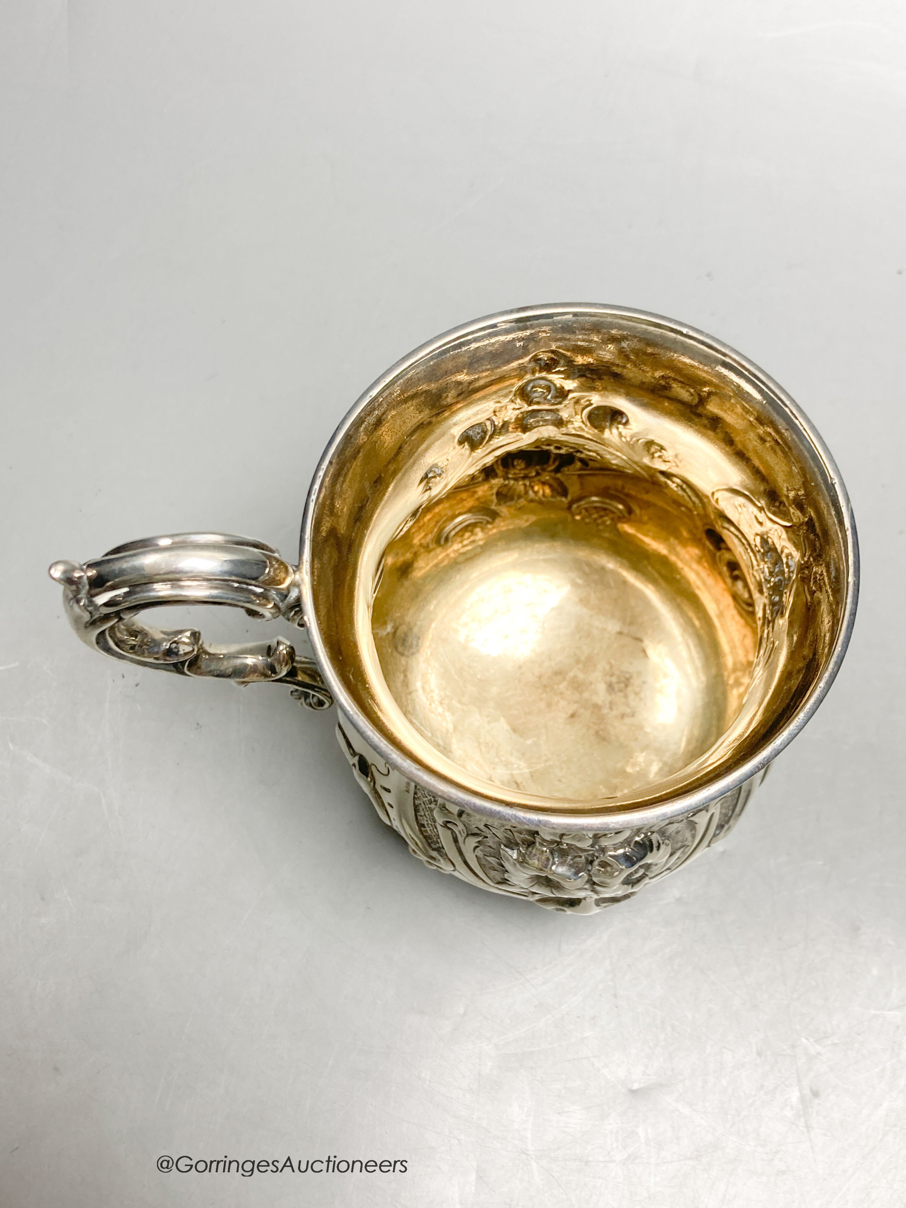 A Victorian embossed silver mug, George John Richards, London 1856, 12.5cm, 7.5 oz.